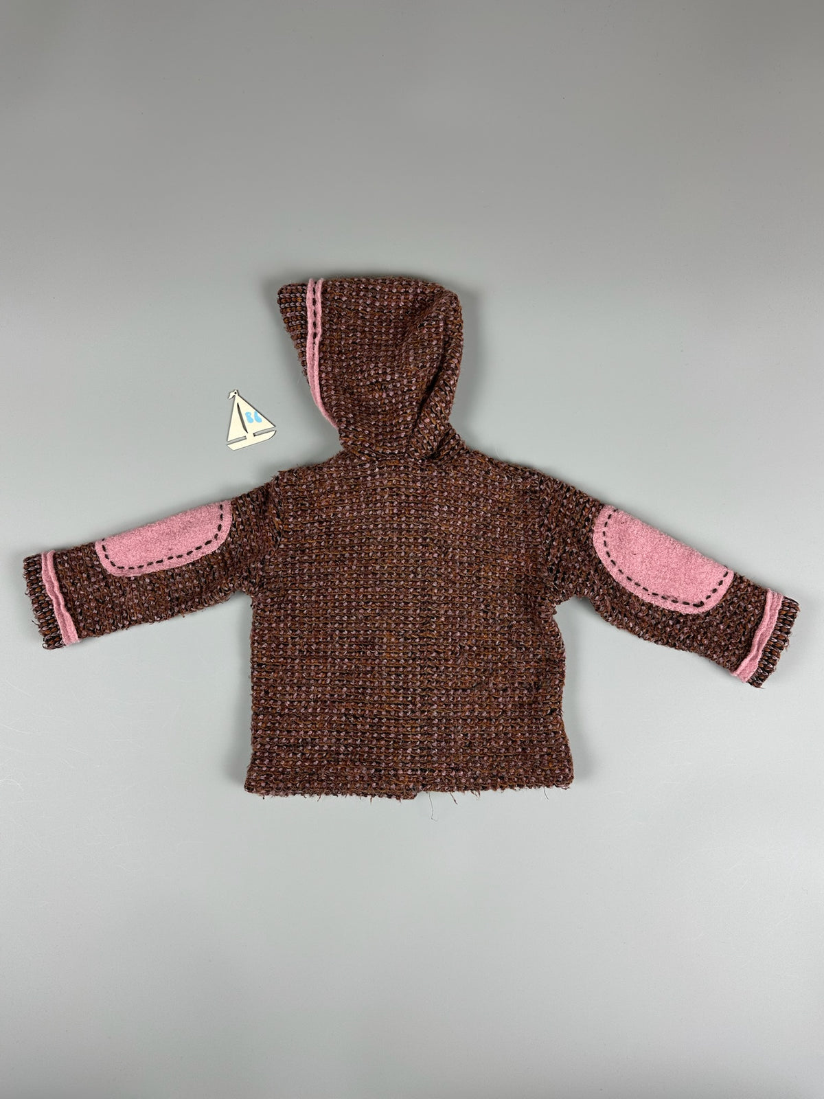 Gestrickte Jacke lila/rosa mit Blumen Gr.86