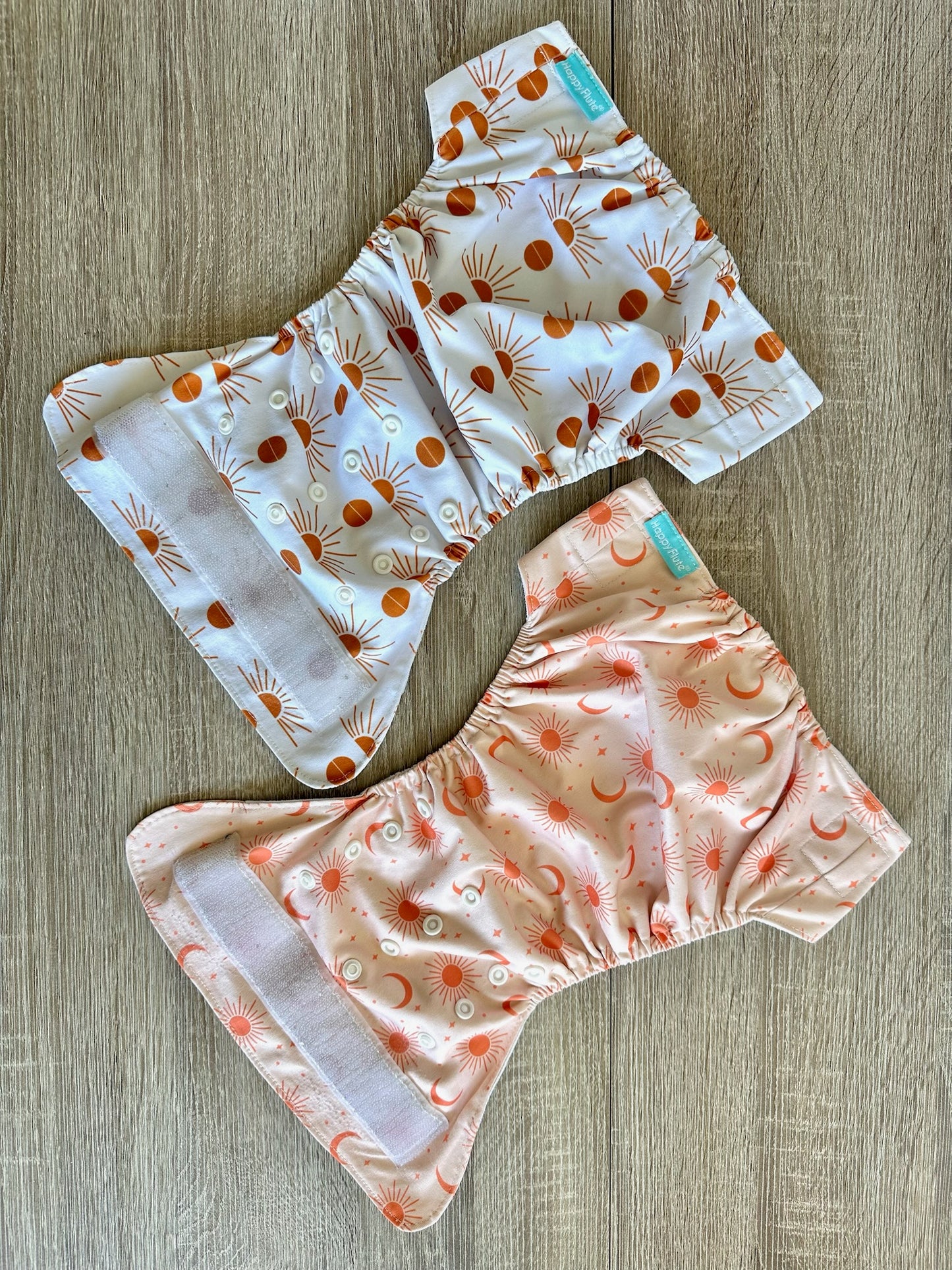 Happy Flute PU Stoffwindelhosen bis 10kg weiß/ orange mit Sonnen